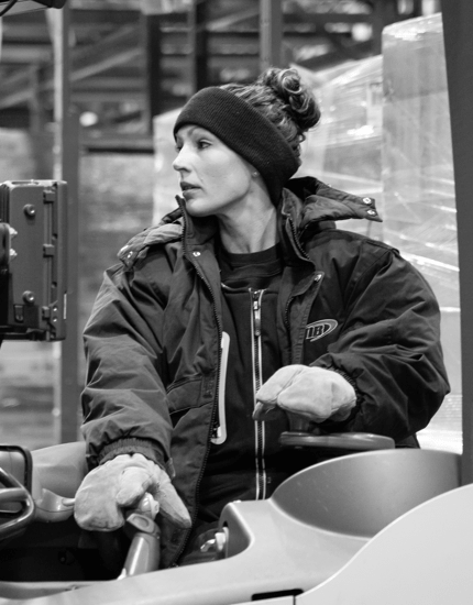 Reyes Holdings forklift operator working at the Reyes Beer Division warehouse.