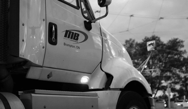 Image of a Martin Brower's 18-wheeler truck passenger door.