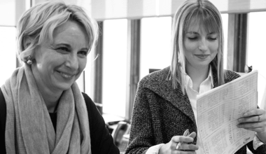 Two Reyes Holdings team members having a meeting.