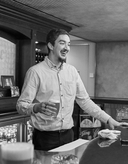 A Reyes Holdings' Beer Division team member enjoying a Reyes' beverage product