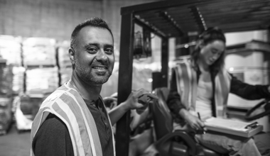 Two Reyes Holdings forklift operators working at the Martin Brower warehouse.