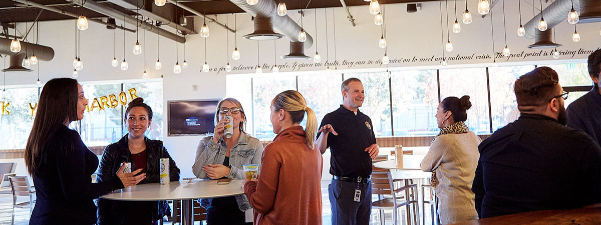Reyes Beer Division employees socializing and gathered together in Tiger Joe's Pub.