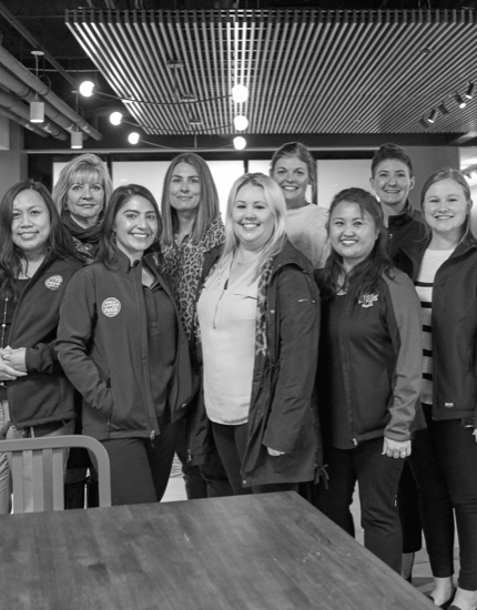 Group of Reyes Holdings team members gathered together.