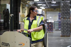 gate-city-brand-logo Reyes Holdings forklift operator working at the Reyes Beer Division warehouse.